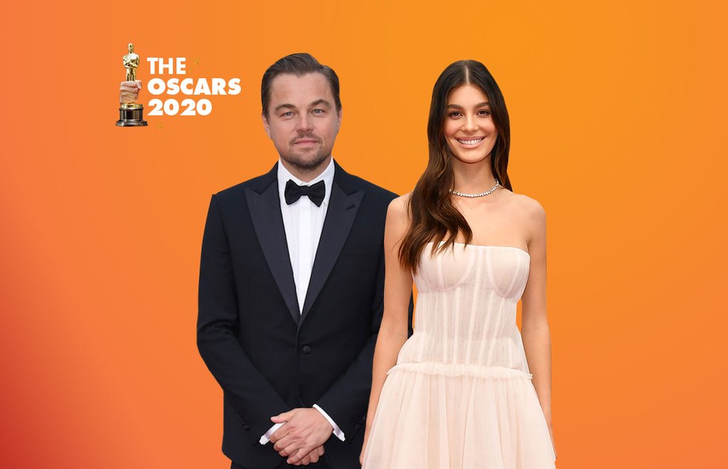 Leonardo-Di-Caprio-Camila-Morrone-Sentados-Al-PAcino