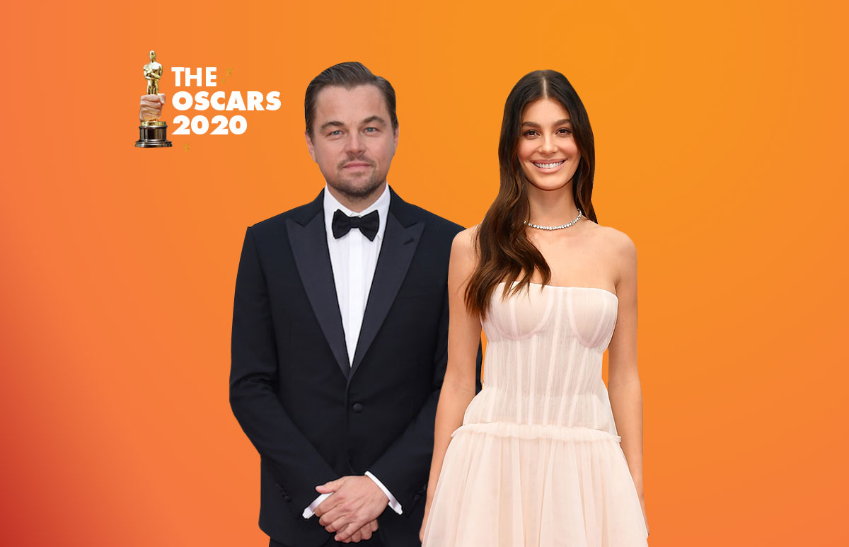 Leonardo-Di-Caprio-Camila-Morrone-Sentados-Al-PAcino